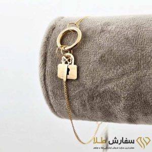 دستبند تیفانی قفل و قلب طلا ST5029