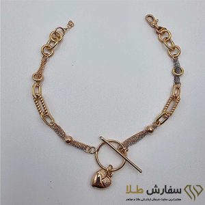دستبند تیفانی طلا طرح صدف و قلب ST4821