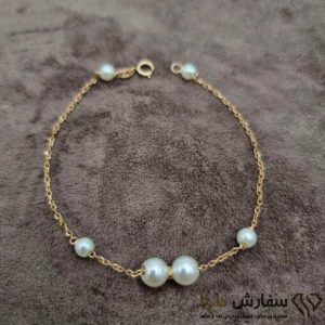 دستبند طلا مروارید و گوی البرنادو با ده طرح جذاب ST4992